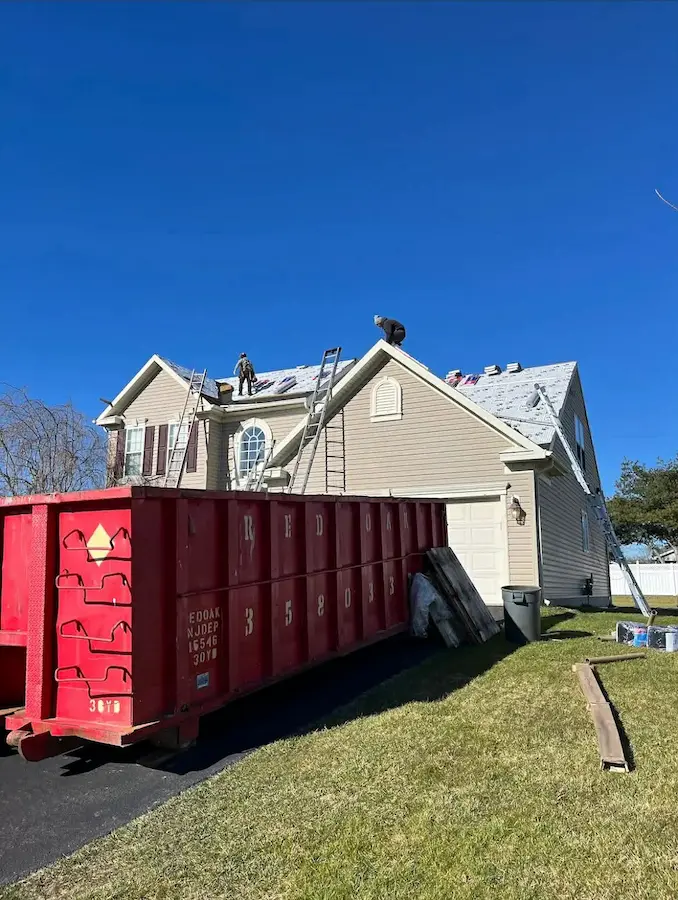 Seamless aluminum K-style gutters installed on a two-story colonial in Montgomery County, PA